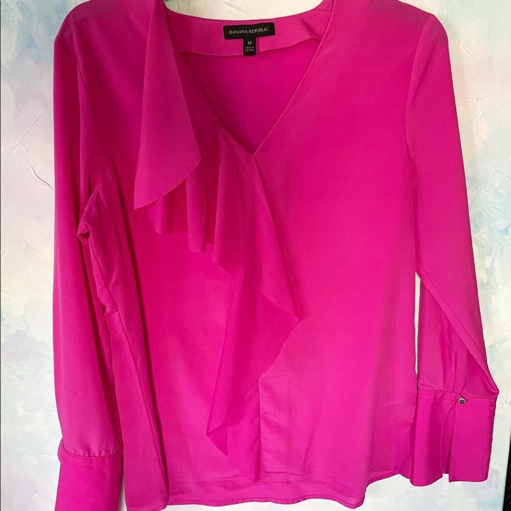 Pink ruffled blouse